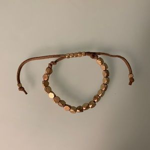 Bronze colored beads with leather cord adjustable bracelet